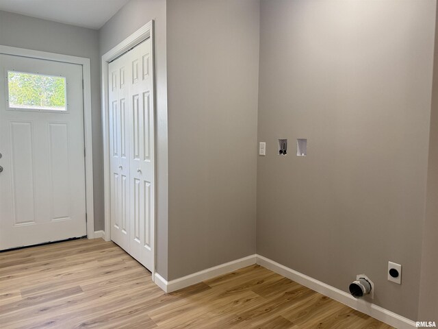 1609 W Chestnut St, Marion, IL 62959 - laundry room with baseboards, light wood finished floors, hookup for an electric dryer, and washer hookup