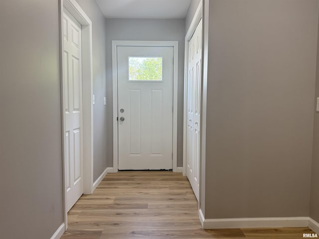 1609 W Chestnut St, Marion, IL 62959 - doorway featuring light wood-style flooring and baseboards