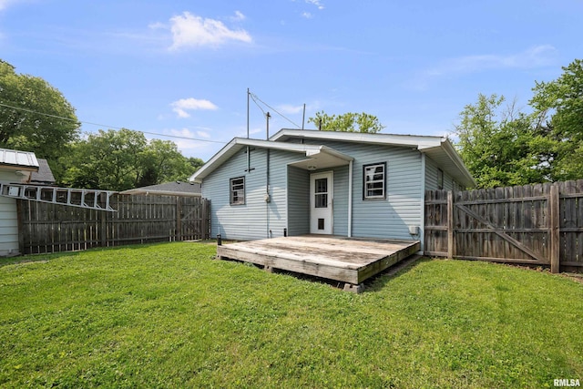 129 State St, Carbon Cliff, IL 61239 - back of property featuring a deck