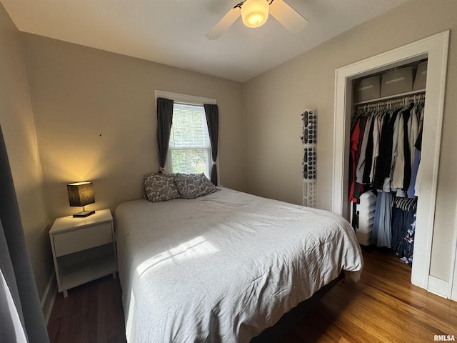 2139 10th St, East Moline, IL 61244 - bedroom with wood finished floors, a closet, ceiling fan, and vaulted ceiling