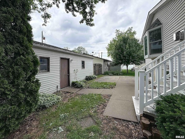 2347 W Lombard St, Davenport, IA 52804 - view of yard featuring a patio and cooling unit