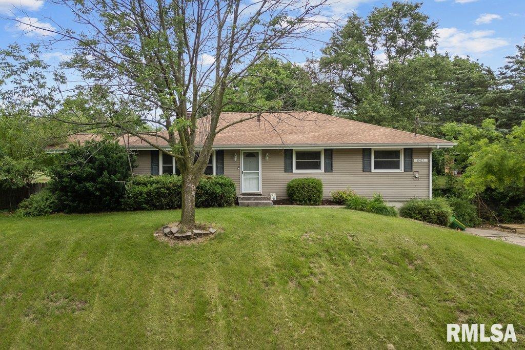 8421 55th St, Coal Valley, IL 61240 - single story home with a front yard