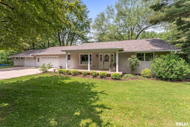 11 Shady Ln, Geneseo, IL 61254 - single story home featuring a porch, a garage, a front lawn, and driveway