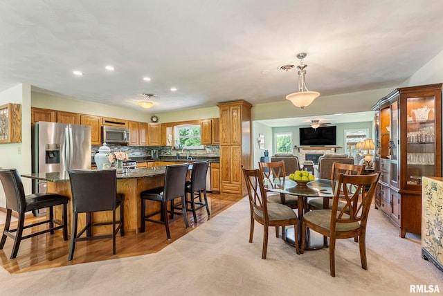 11 Shady Ln, Geneseo, IL 61254 - dining space featuring recessed lighting and light carpet