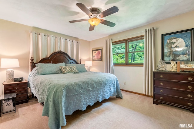 11 Shady Ln, Geneseo, IL 61254 - bedroom with light colored carpet, baseboards, and ceiling fan