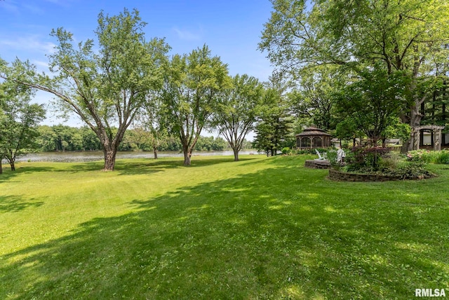 11 Shady Ln, Geneseo, IL 61254 - view of grassy yard with a gazebo and a water view