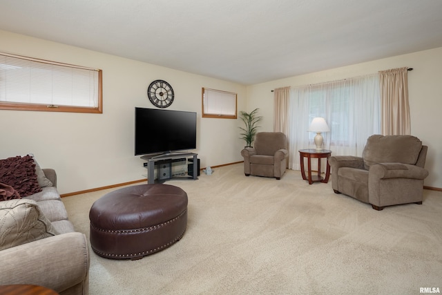 2737 28th Ave, Rock Island, IL 61201 - living room with carpet floors, baseboards, and healthy amount of natural light