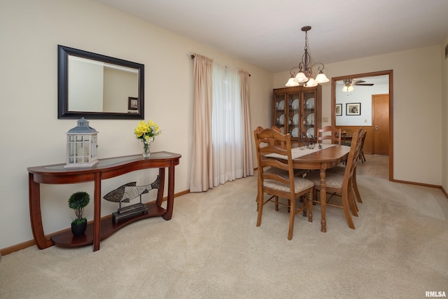 2737 28th Ave, Rock Island, IL 61201 - carpeted dining area featuring baseboards and ceiling fan