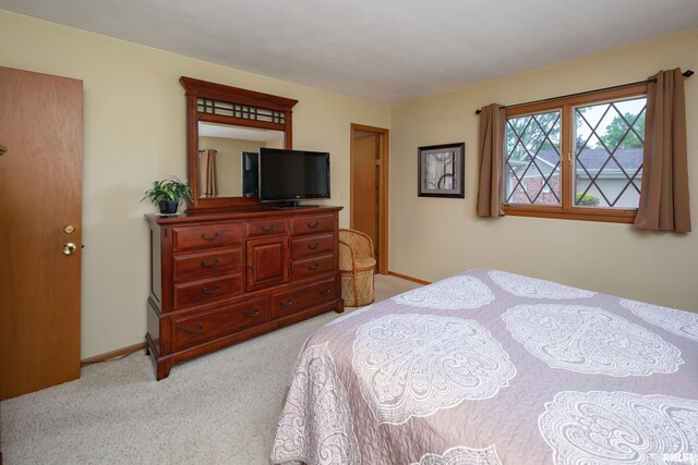 2737 28th Ave, Rock Island, IL 61201 - bedroom with light carpet and baseboards