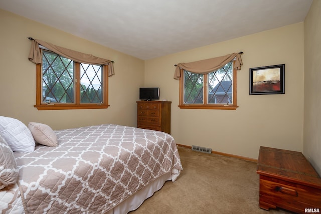 2737 28th Ave, Rock Island, IL 61201 - carpeted bedroom featuring baseboards