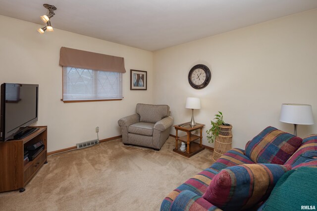 2737 28th Ave, Rock Island, IL 61201 - living area featuring light colored carpet and baseboards