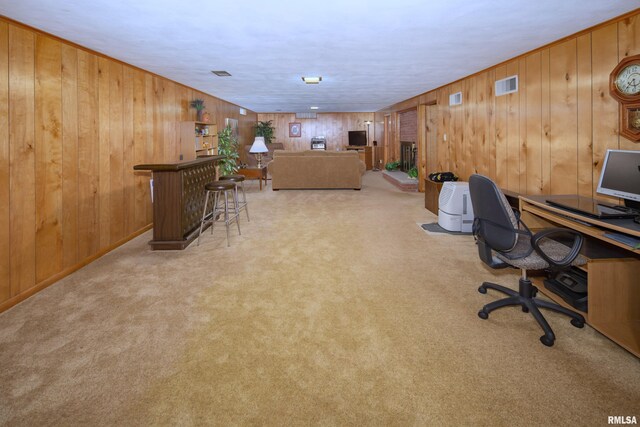 2737 28th Ave, Rock Island, IL 61201 - office featuring wooden walls, light carpet, and a dry bar