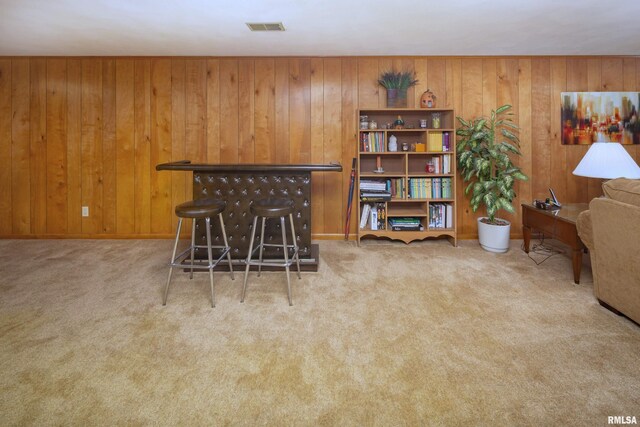 2737 28th Ave, Rock Island, IL 61201 - carpeted dining area featuring wooden walls