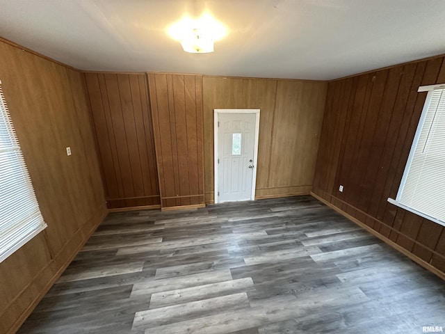 431 N 5th St, Quincy, IL 62301 - unfurnished dining area with wood finished floors and wooden walls