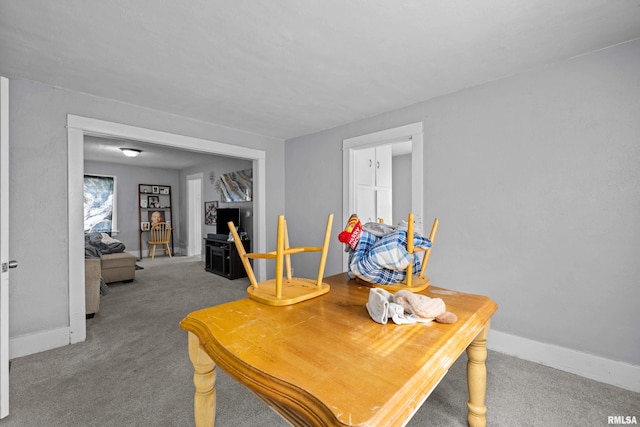 2734 Bridge Ave, Davenport, IA 52803 - dining area with carpet and baseboards
