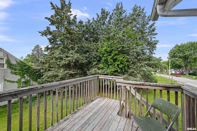 2734 Bridge Ave, Davenport, IA 52803 - wooden terrace featuring a lawn