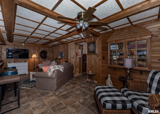 726 51st Ave Unit 20, East Moline, IL 61244 - living area with wooden walls and a ceiling fan