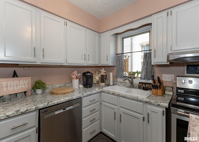 726 51st Ave Unit 20, East Moline, IL 61244 - kitchen with stainless steel appliances, a sink, under cabinet range hood, white cabinetry, and a textured ceiling
