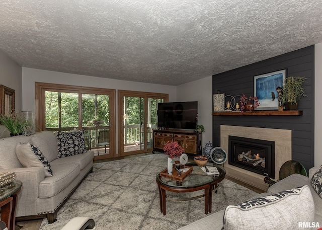 726 51st Ave Unit 20, East Moline, IL 61244 - living area with a textured ceiling and a fireplace