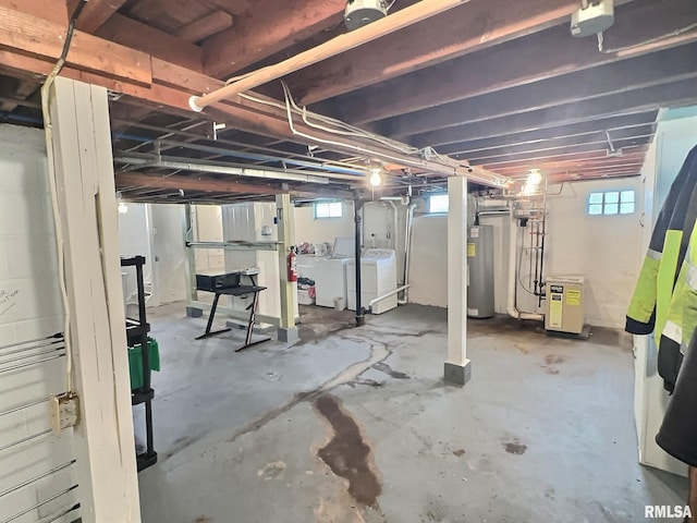 1324 Grandview Dr, Clinton, IA 52732 - below grade area with electric water heater and washing machine and dryer