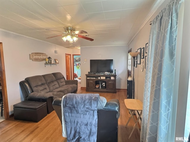 1324 Grandview Dr, Clinton, IA 52732 - living area featuring wood finished floors, a ceiling fan, and ornamental molding