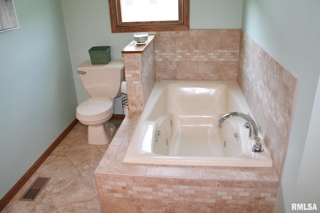 3996 Partridge Cir, Bettendorf, IA 52722 - bathroom with a bath, toilet, and tile patterned floors