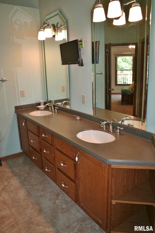 3996 Partridge Cir, Bettendorf, IA 52722 - full bath with double vanity and tile patterned floors