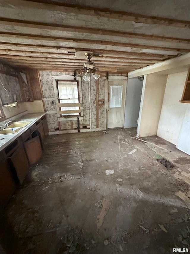 700 Cedar St, Muscatine, IA 52761 - kitchen featuring a sink and a ceiling fan