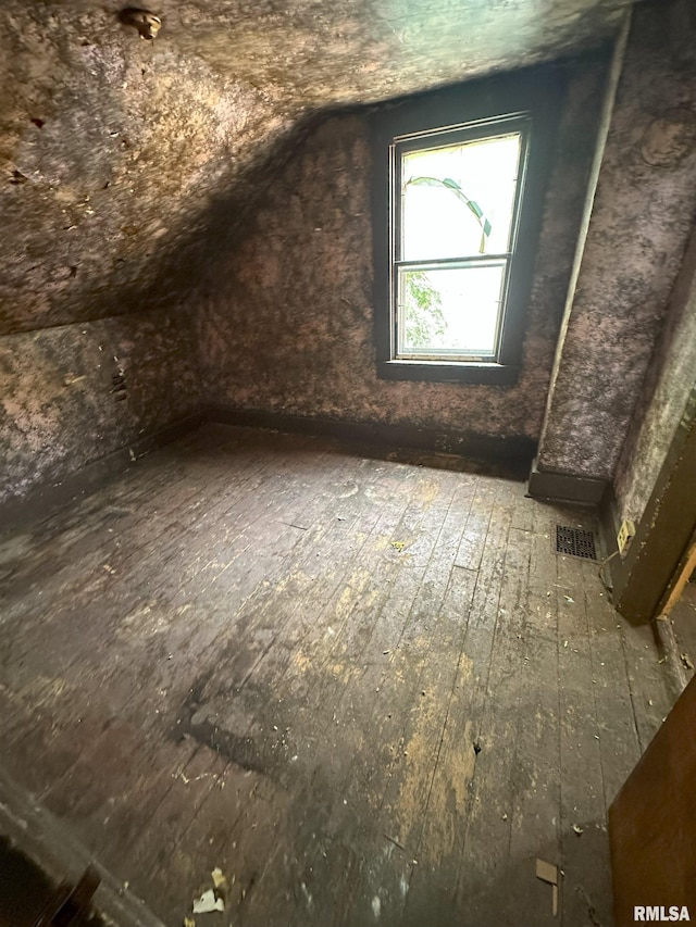 700 Cedar St, Muscatine, IA 52761 - additional living space featuring hardwood / wood-style floors and lofted ceiling
