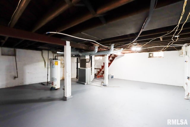 1617 Payson Ave, Quincy, IL 62301 - below grade area with gas water heater, heating unit, and stairs