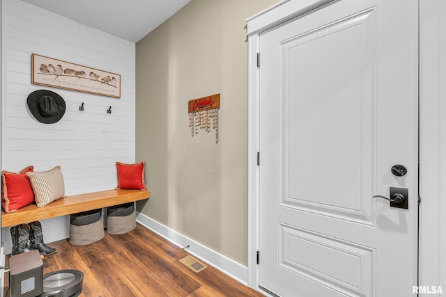 6997 Matthews Pass, Bettendorf, IA 52722 - mudroom featuring dark wood finished floors, baseboards, and wooden walls
