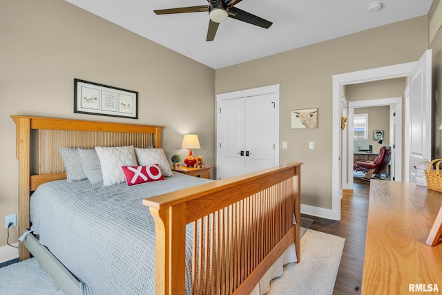 6997 Matthews Pass, Bettendorf, IA 52722 - bedroom with wood finished floors, baseboards, a closet, and ceiling fan