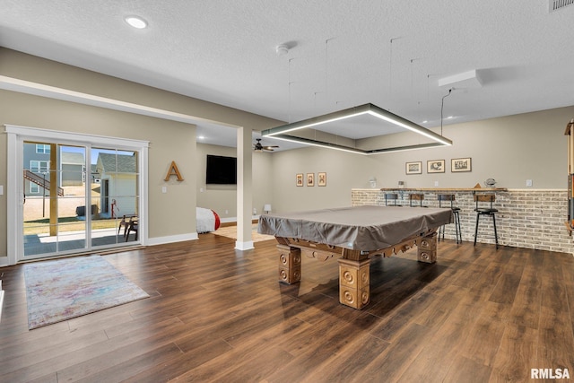 6997 Matthews Pass, Bettendorf, IA 52722 - recreation room featuring wood finished floors, billiards table, a textured ceiling, and baseboards