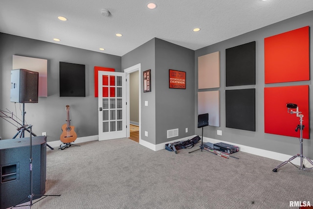 6997 Matthews Pass, Bettendorf, IA 52722 - exercise room featuring recessed lighting, carpet flooring, baseboards, and french doors