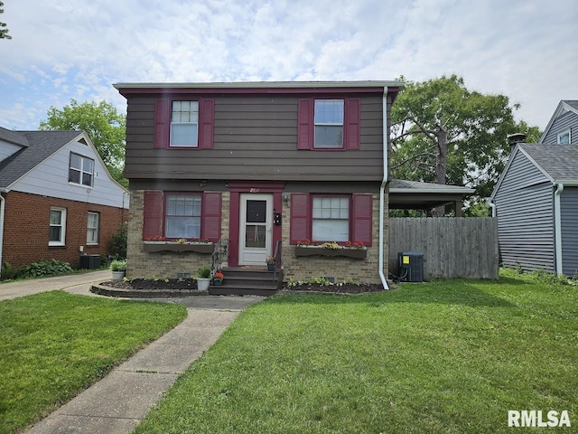 2336 24 1/2 St, Rock Island, IL 61201 - colonial inspired home with entry steps and brick siding