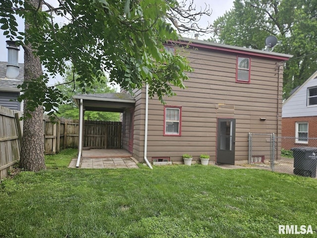 2336 24 1/2 St, Rock Island, IL 61201 - rear view of house with a patio area