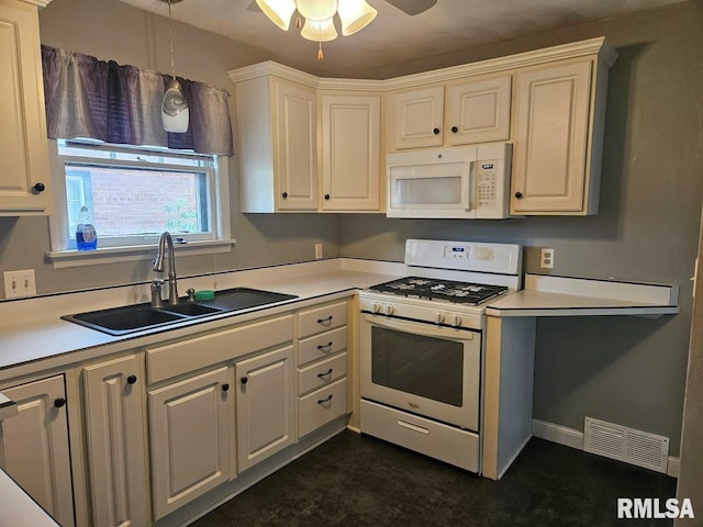 2336 24 1/2 St, Rock Island, IL 61201 - kitchen with white appliances, a sink, light countertops, and ceiling fan