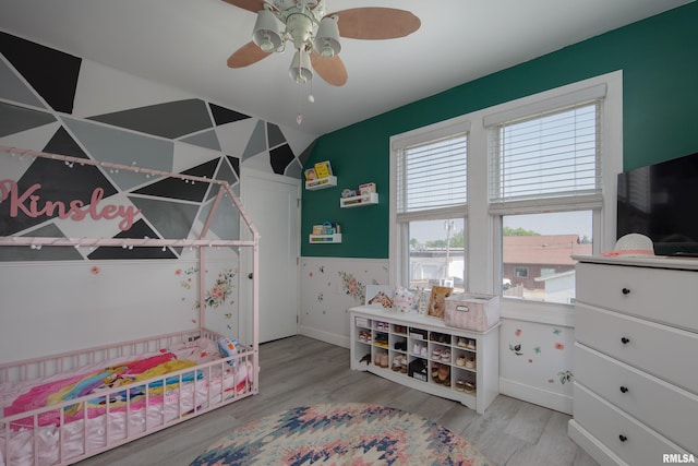 1637 24th Ave, Moline, IL 61265 - bedroom with baseboards, wood finished floors, and a nursery area