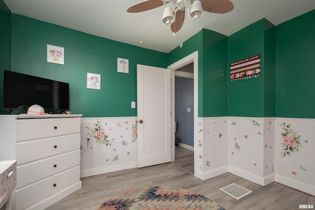 1637 24th Ave, Moline, IL 61265 - bedroom with wood finished floors, baseboards, and a ceiling fan
