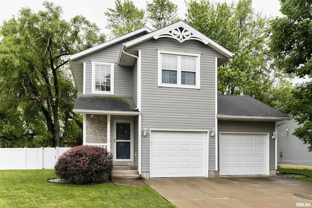 414 11th Avenue A Court, Silvis, IL 61282 - view of front of property with driveway and roof with shingles