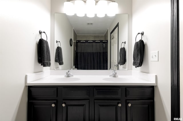 414 11th Avenue A Court, Silvis, IL 61282 - full bathroom with double vanity and a shower with curtain