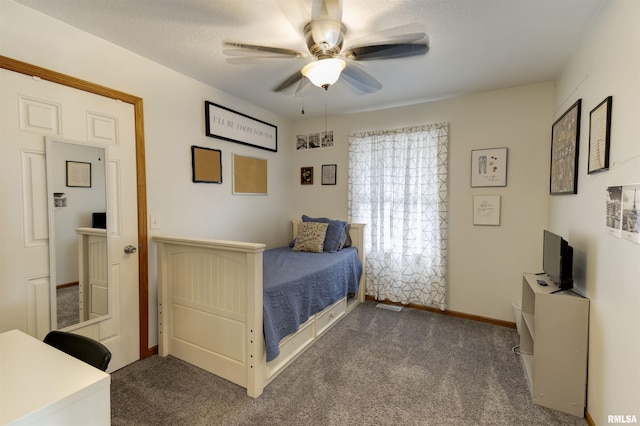 414 11th Avenue A Court, Silvis, IL 61282 - bedroom featuring dark colored carpet, a ceiling fan, and baseboards