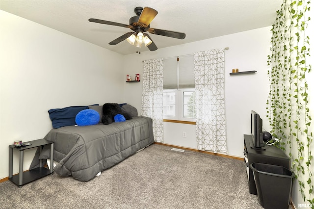 414 11th Avenue A Court, Silvis, IL 61282 - bedroom featuring baseboards, carpet floors, and ceiling fan