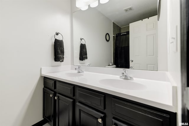 414 11th Avenue A Court, Silvis, IL 61282 - bathroom with double vanity and curtained shower