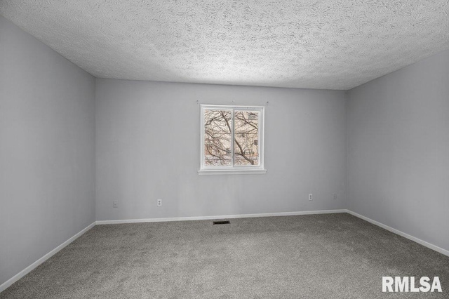 4015 Lillie Ave Unit 106, Davenport, IA 52806 - unfurnished room with carpet, baseboards, and a textured ceiling