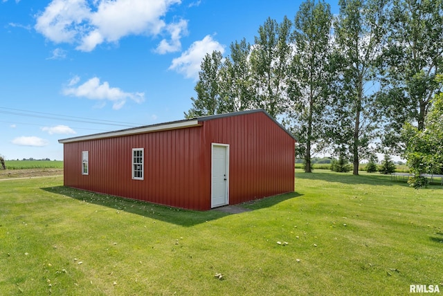 904 W Main St, Reynolds, IL 61279 - view of pole building featuring a yard
