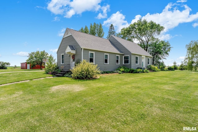 904 W Main St, Reynolds, IL 61279 - view of front of home with a front lawn and a shingled roof