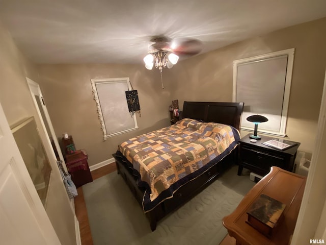 904 W Main St, Reynolds, IL 61279 - bedroom featuring wood finished floors and a ceiling fan
