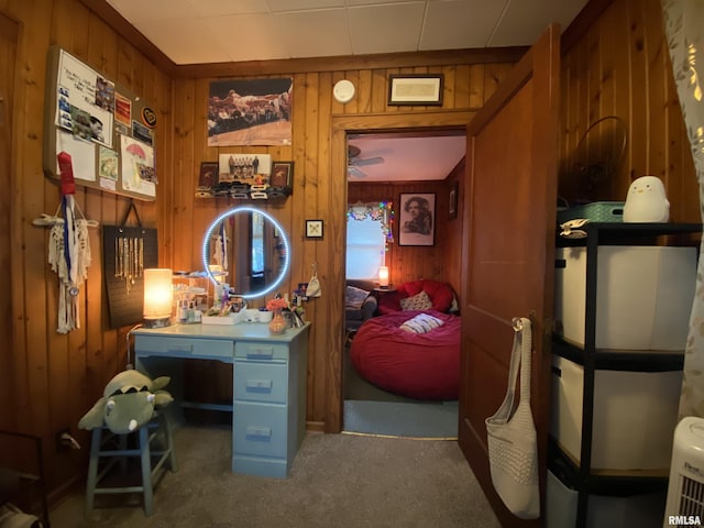 904 W Main St, Reynolds, IL 61279 - carpeted home office with wooden walls and a ceiling fan