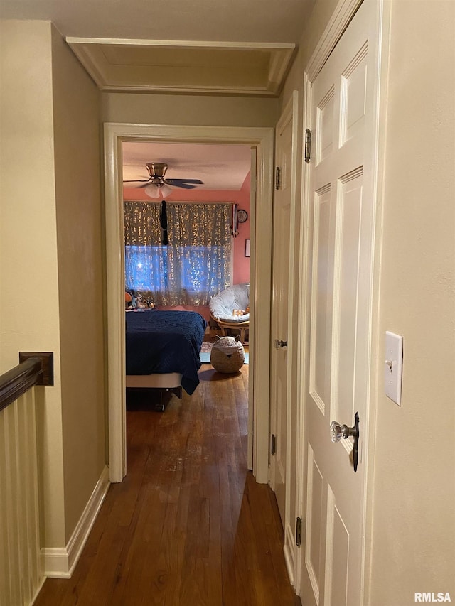 904 W Main St, Reynolds, IL 61279 - corridor featuring dark wood-style floors and baseboards